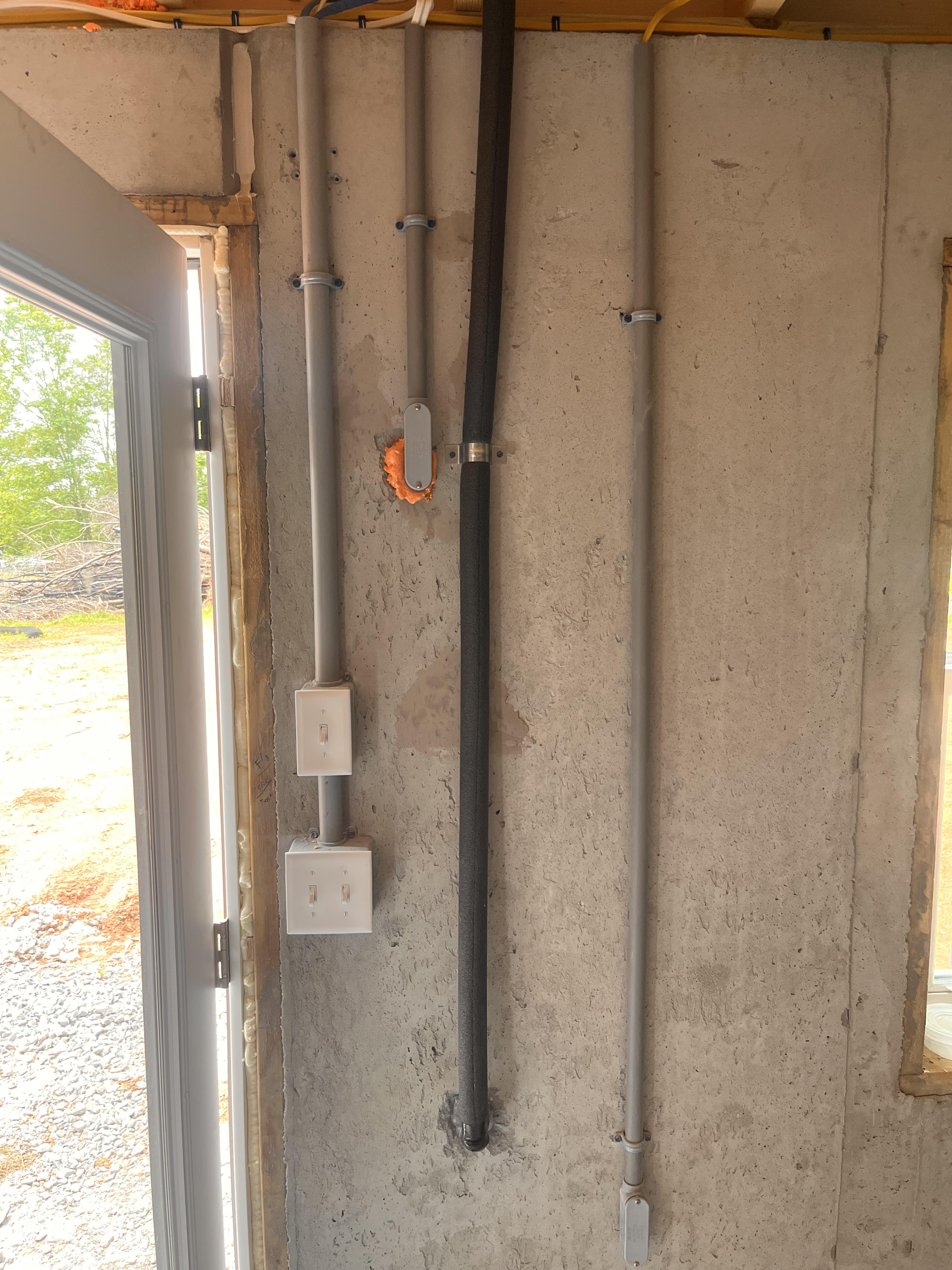Clean Electrical Conduit Rough-In in Home Basement